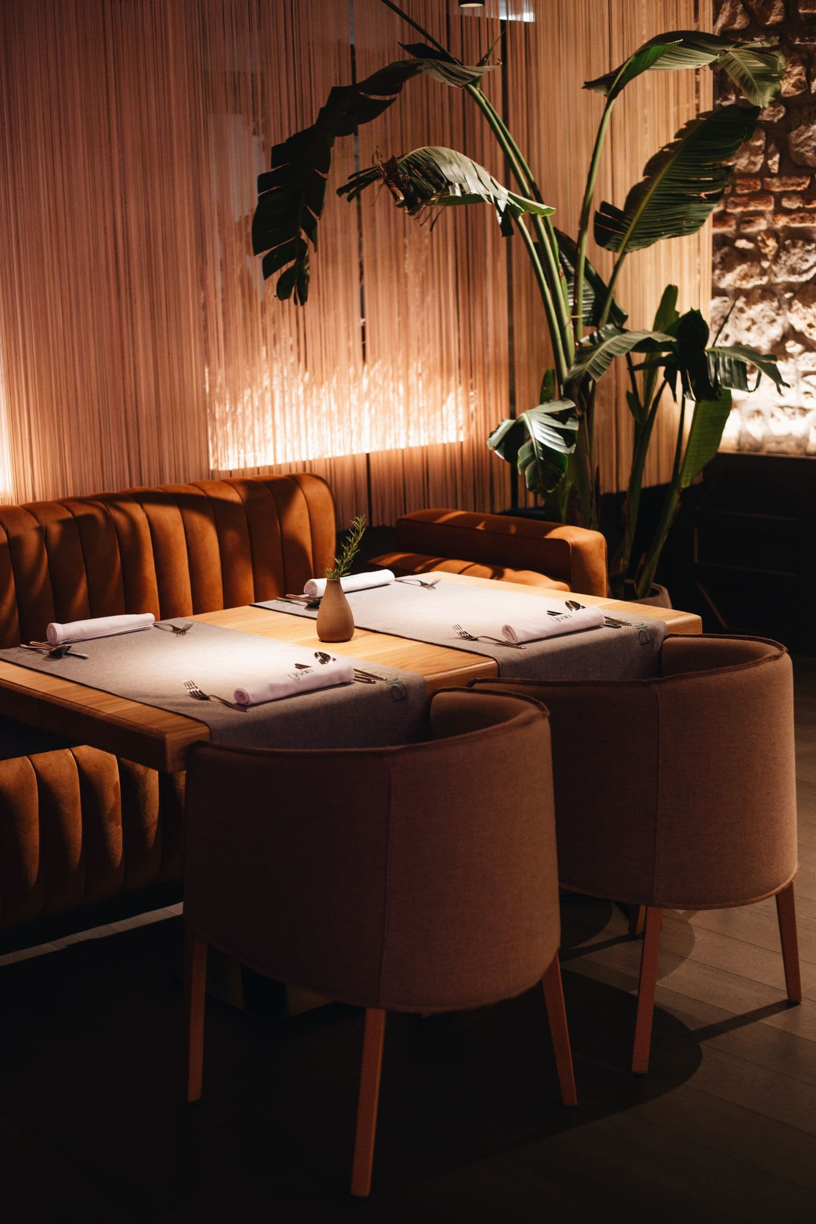 A restaurant table setting with plated dishes